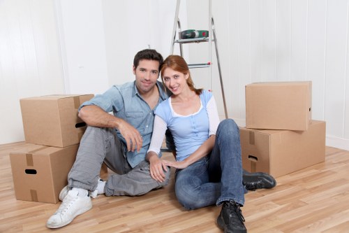 Local movers packing fragile household items in Dulwich